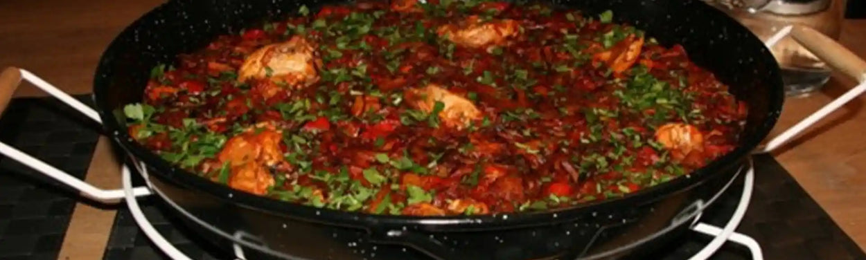 Recept paella mixta met gamba’s, mosselen, inktvis, verse chorizo en kip