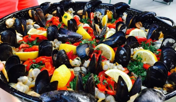 Recept paella vis met gamba’s, mosselen, kokkels en inktvis